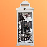 Die Schneelaterne zeigt eine „heimatliche“ Darstellung aus Materialmix